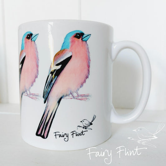 Ceramic mug with Chaffinch painting by Fairy Flint repeated round the mug, printed withy eco friendly inks