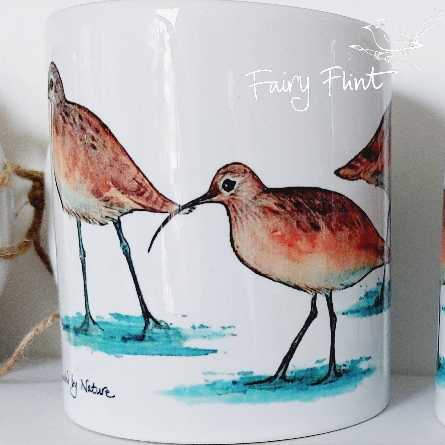 Ceramic mug with Curlew painting by Fairy Flint, printed withy eco friendly inks