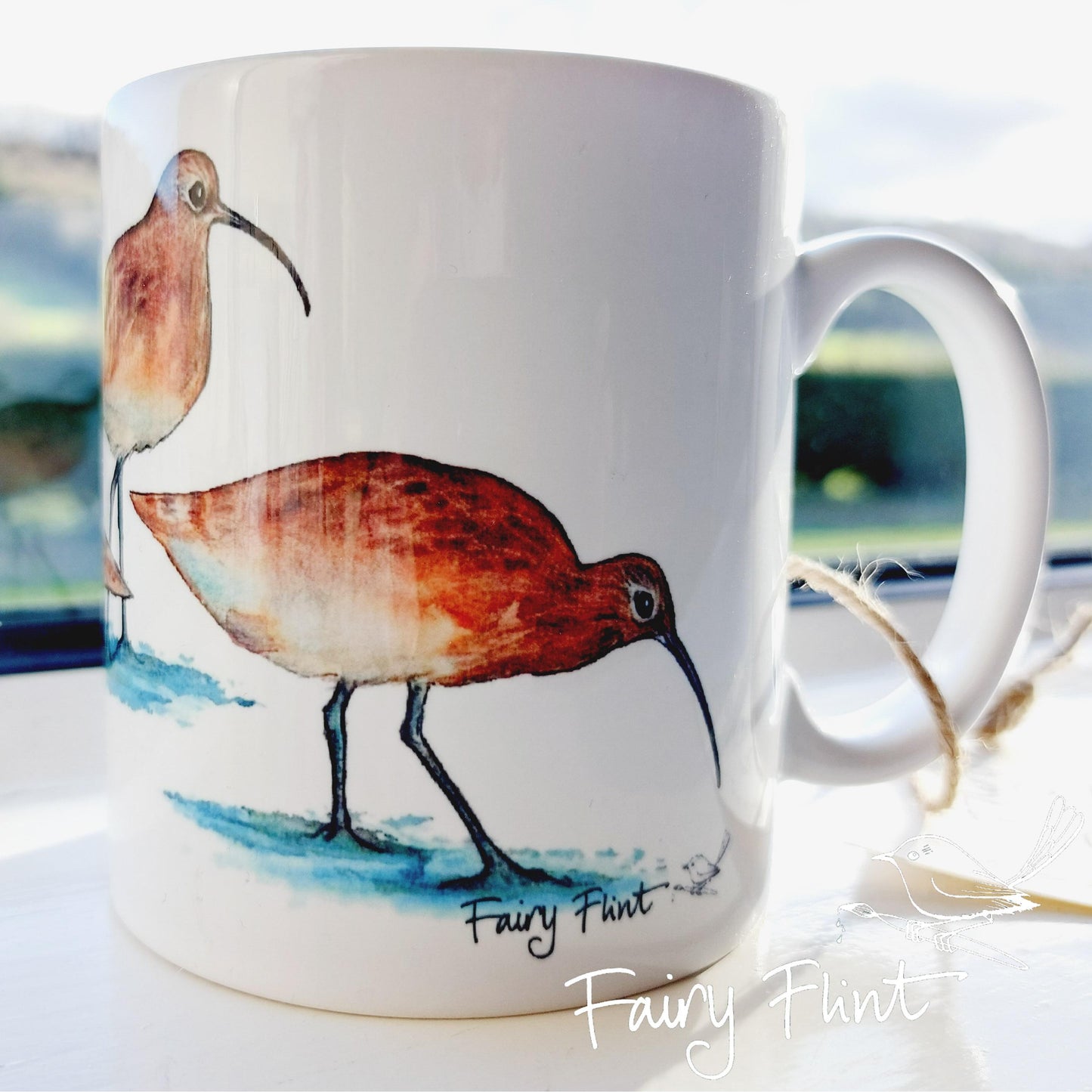 Ceramic mug with Curlew painting by Fairy Flint, printed withy eco friendly inks, photoshoot at Eaton Manor, Shropshire, Wenlock edge in the background