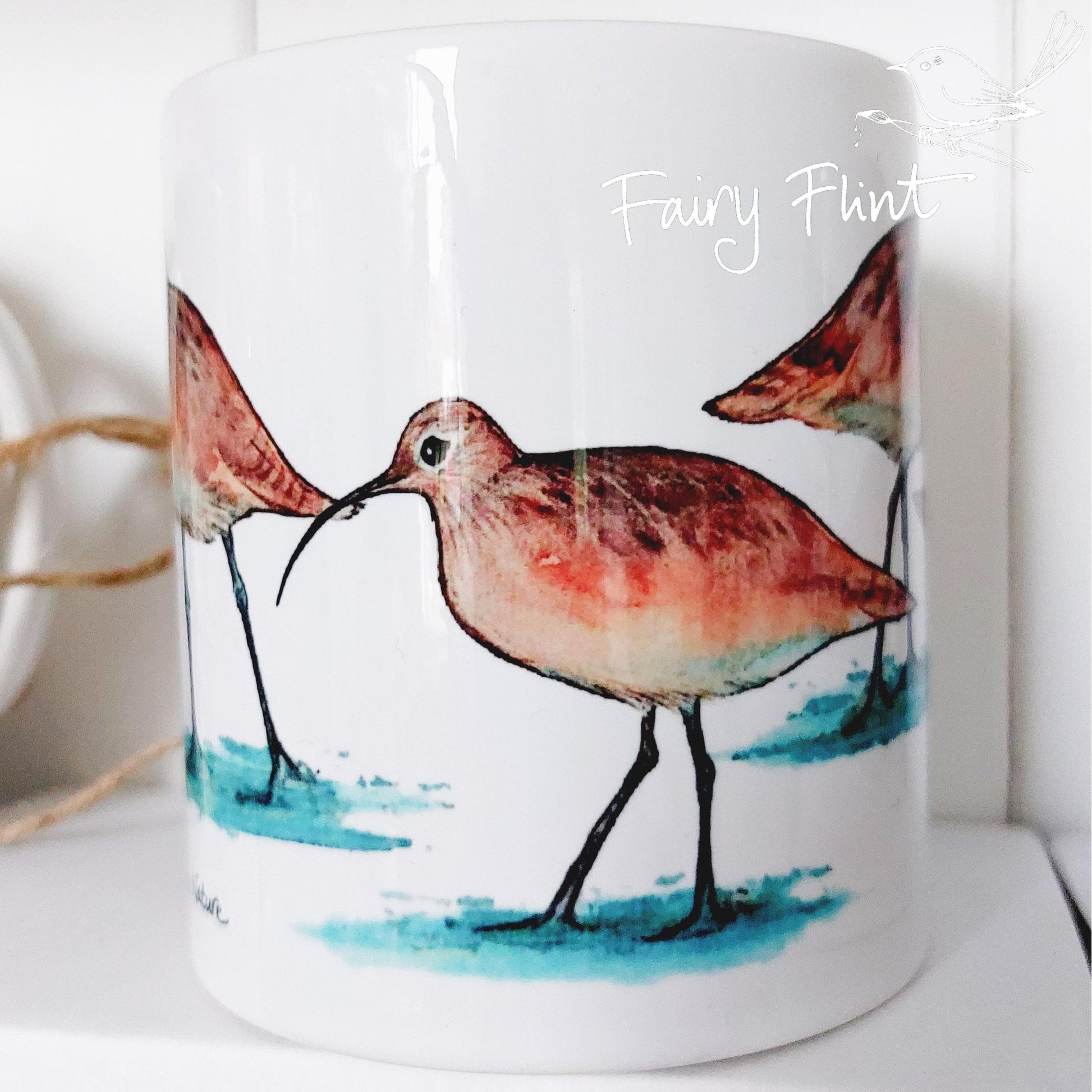 Ceramic mug with Curlew painting by Fairy Flint, printed withy eco friendly inks