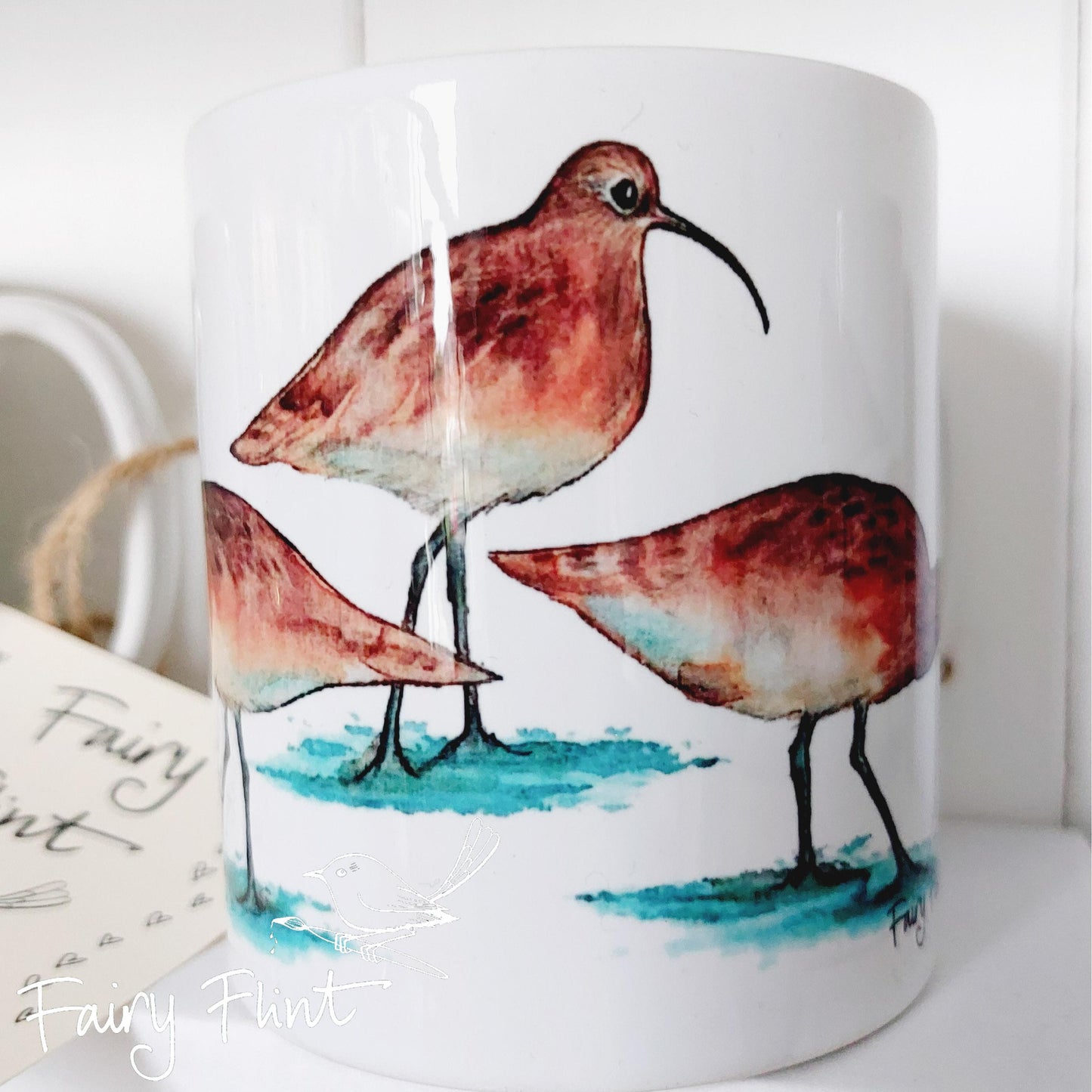 Ceramic mug with Curlew painting by Fairy Flint, printed withy eco friendly inks