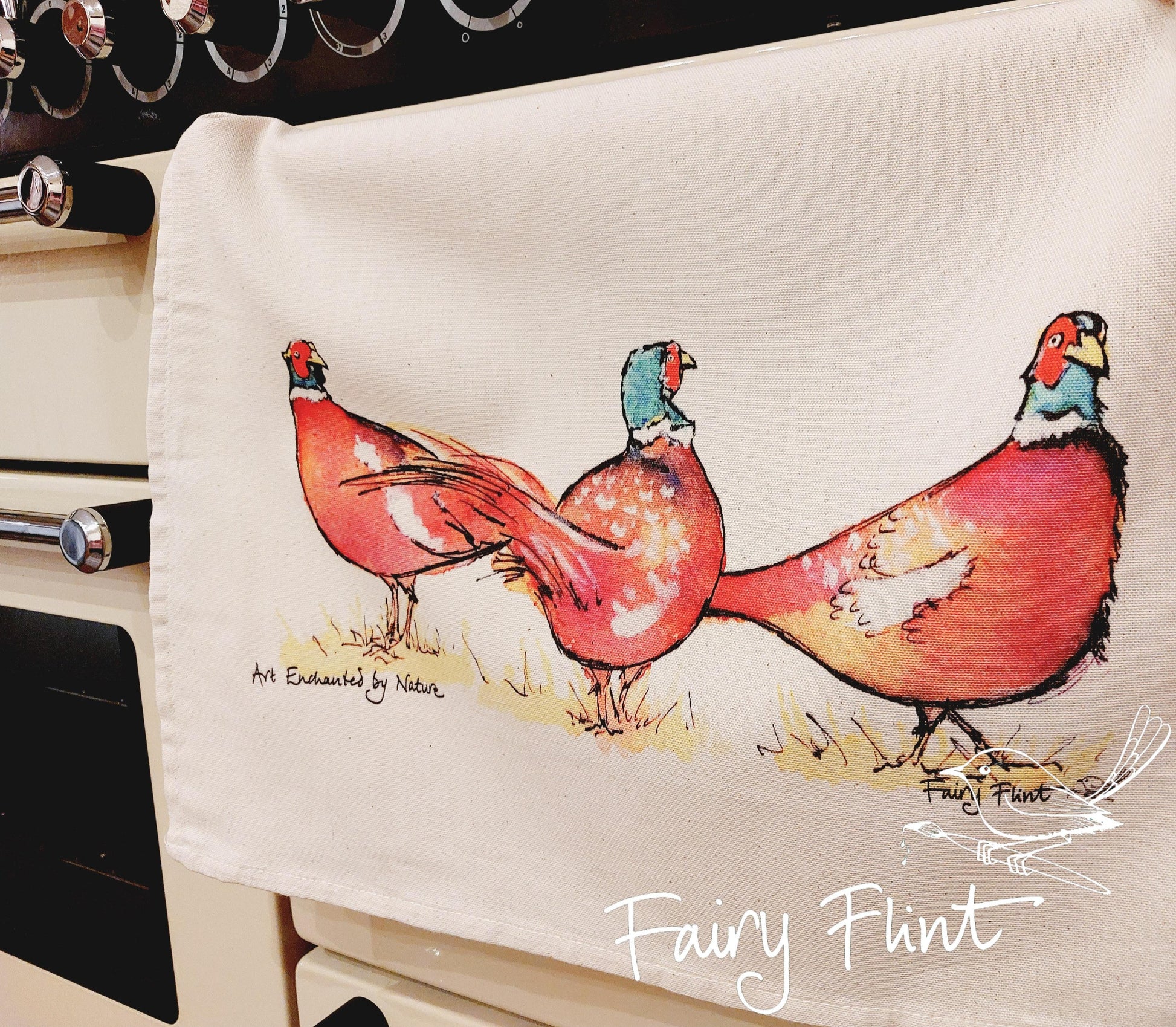 Tea towel with eco print Pheasant painting design by Fairy Flint photoshoot at Eaton Manor Shropshire, tea towel hanging on range cooker