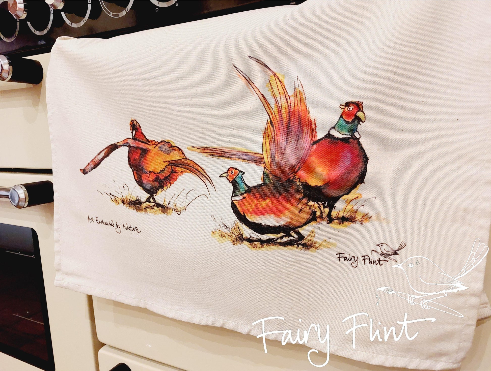 Tea towel with eco print Pheasant painting design by Fairy Flint photoshoot at Eaton Manor Shropshire, tea towel hanging on range cooker