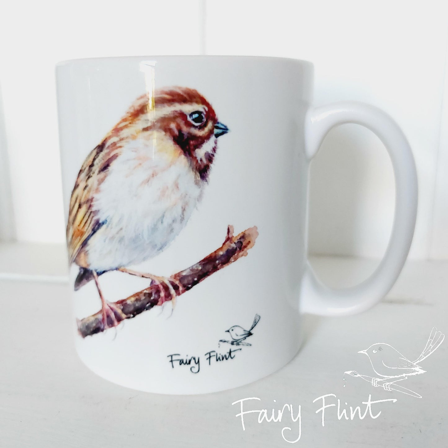 White mug with Reed Bunting painting 