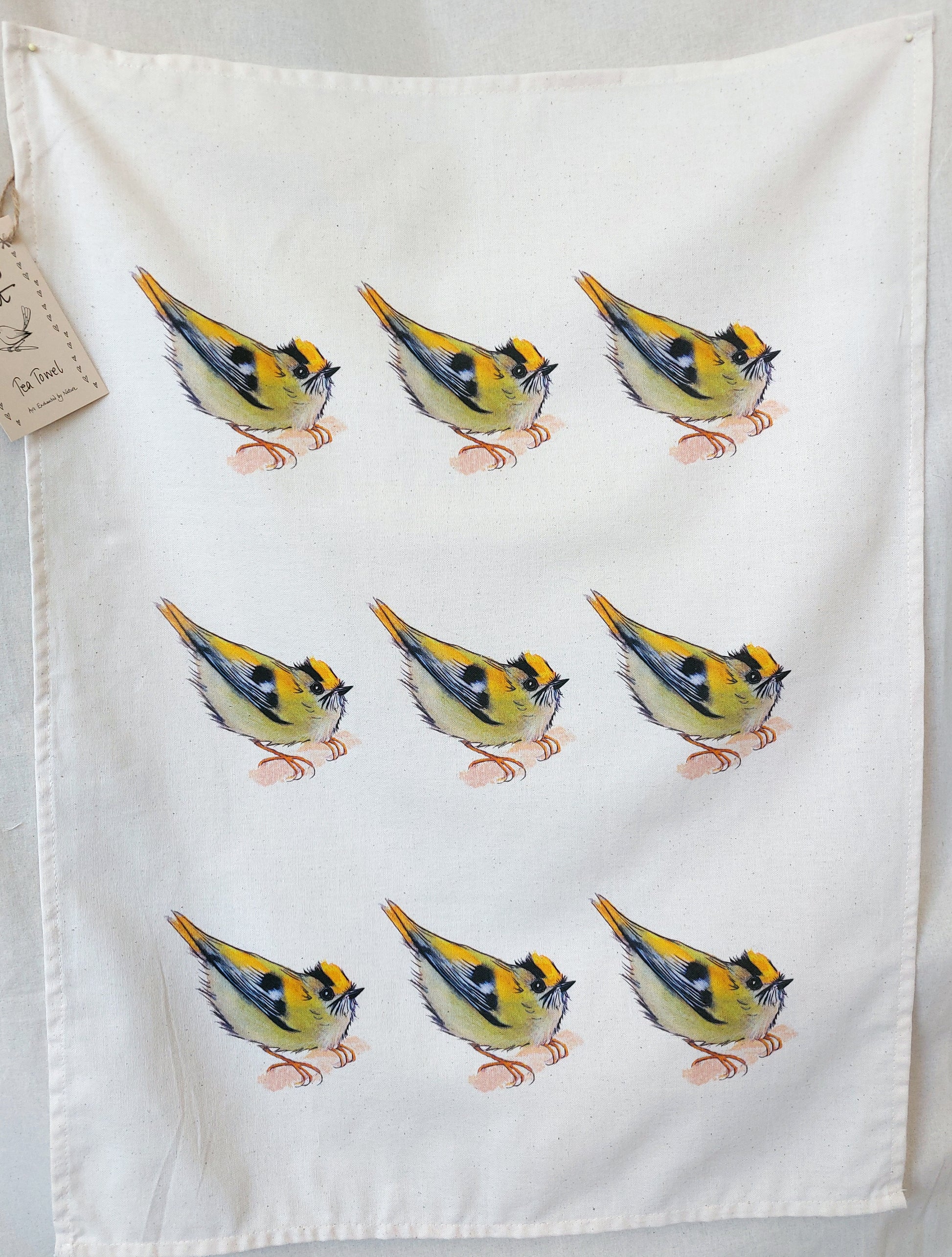 Tea towel with goldcrests repeated 9 times by Fairy Flint 