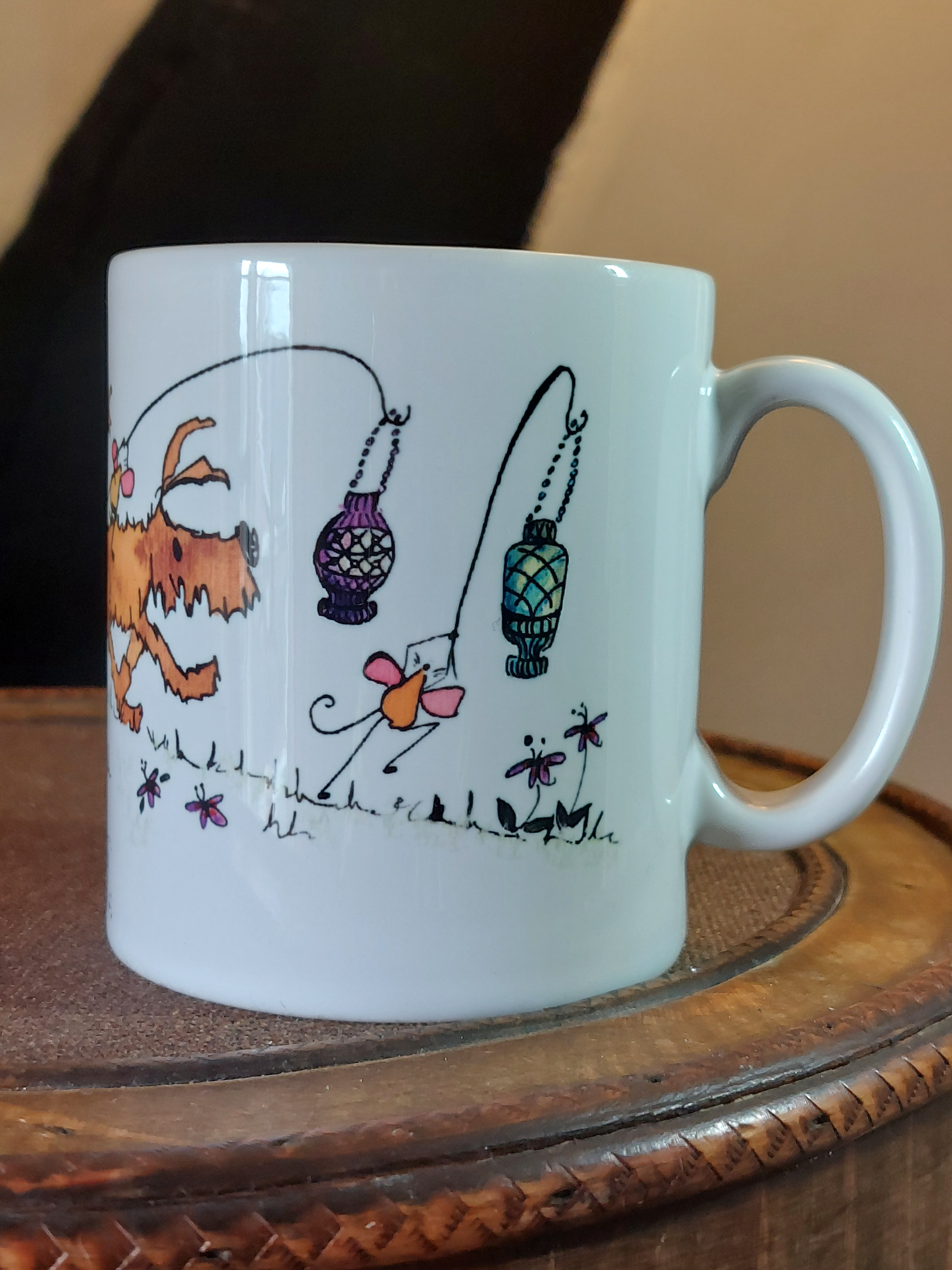 Ceramic mug with cartoon dog and mice having a fun Lantern Parade with Parasols by Fairy Flint at Atelier Foolery