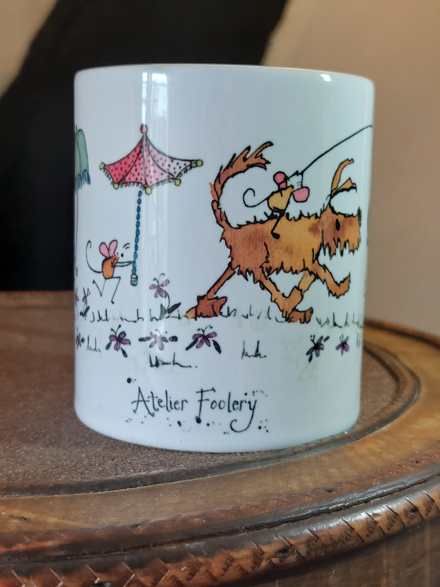 Ceramic mug with cartoon dog and mice having a fun Lantern Parade with Parasols by Fairy Flint at Atelier Foolery