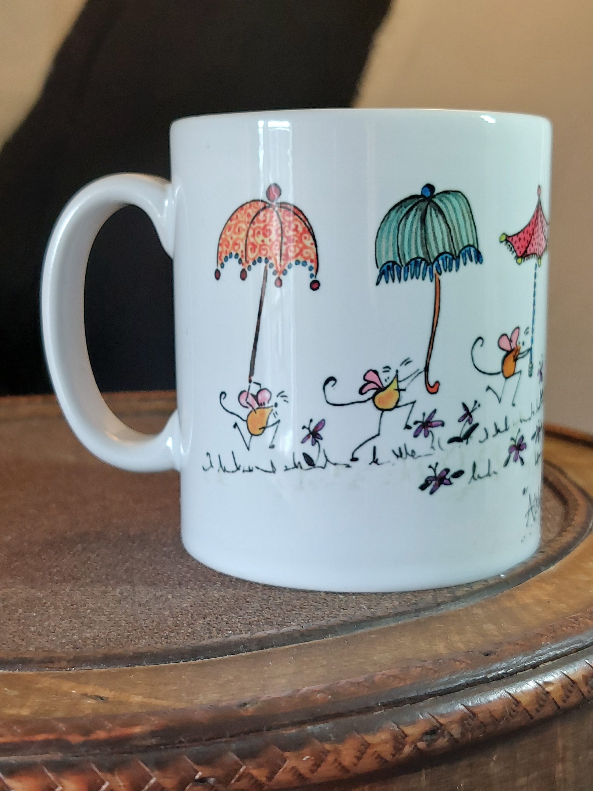 Ceramic mug with cartoon dog and mice having a fun Lantern Parade with Parasols by Fairy Flint at Atelier Foolery