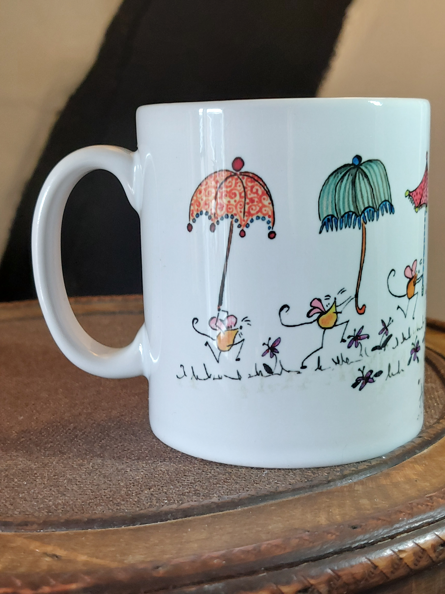 Ceramic mug with cartoon dog and mice having a fun Lantern Parade with Parasols by Fairy Flint at Atelier Foolery