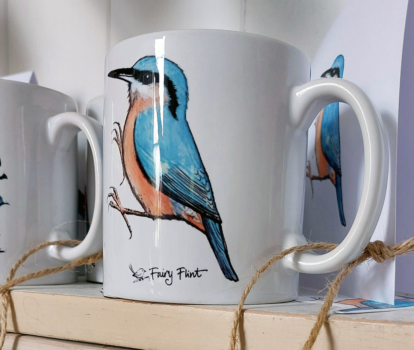 Ceramic mug with Nuthatches by Fairy Flint 